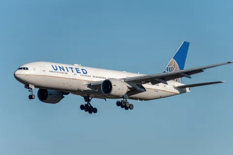 N77006 Boeing 777 United Airlines Landing in International Narita Airport, Japan.