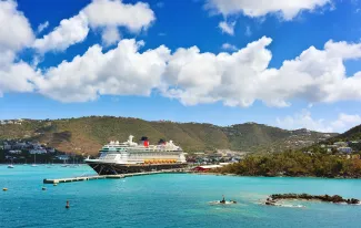 ST. THOMAS, US VIRGIN ISLANDS - March 27, 2019: Cruise ship Disney Fantasy docked at St Thomas, on sunny day.