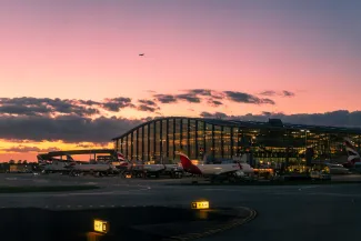 Sunset over Terminal 5 at London Heathrow airport, UK