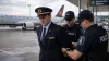 Air canada pilot being arrested for flying without license 